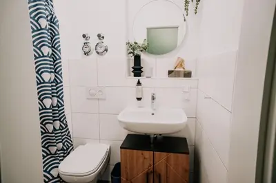 Ein Badezimmer in der Unterkunft Gemütliche Ferienwohnung mit direkter Innenstadtlage