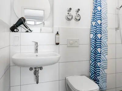 Ein Badezimmer in der Unterkunft Gemütliche Ferienwohnung mit direkter Innenstadtlage