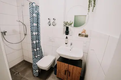 Ein Badezimmer in der Unterkunft Gemütliche Ferienwohnung mit direkter Innenstadtlage