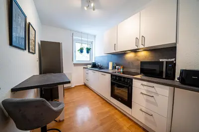 Küche/Küchenzeile in der Unterkunft Coblenz Suites - Design Apartment City - 2 Bedrooms