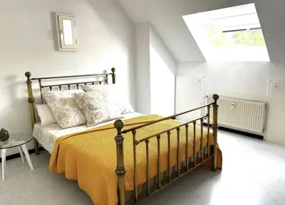 Ein Bett oder Betten in einem Zimmer der Unterkunft Modernes Ferienhaus Sauerblick