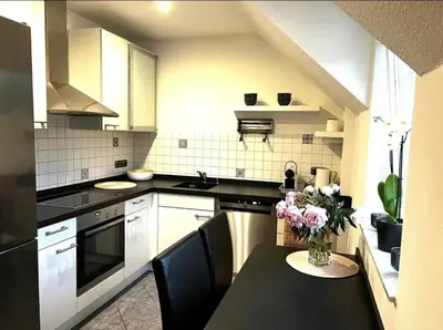 Küche/Küchenzeile in der Unterkunft Modernes Ferienhaus Sauerblick