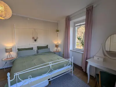 Ein Bett oder Betten in einem Zimmer der Unterkunft Voll ausgestattete Wohnung mit Moselblick