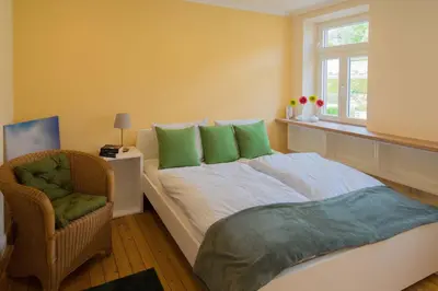 Ein Bett oder Betten in einem Zimmer der Unterkunft Gudd Stuvv in Annis Haus