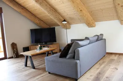 TV/Unterhaltungsangebot in der Unterkunft Waldzeit Lodge - Ferienwohnung Eule