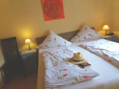 Ein Bett oder Betten in einem Zimmer der Unterkunft Weingut Matthias Dauns