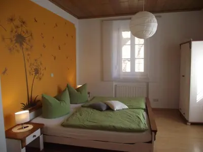 Ein Bett oder Betten in einem Zimmer der Unterkunft Ferienhaus Schneiders