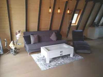 Ein Sitzbereich in der Unterkunft Ferienhaus Freilingen 184
