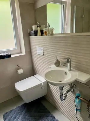Ein Badezimmer in der Unterkunft Ferienwohnung am Festungshang Ehrenbreitstein