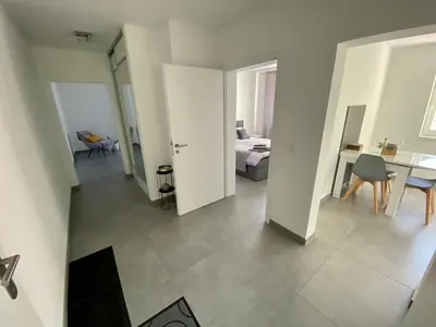 Ein Bett oder Betten in einem Zimmer der Unterkunft Ferienwohnung am Festungshang Ehrenbreitstein