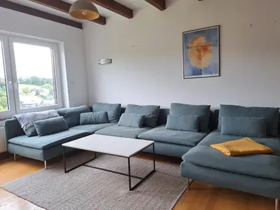 Ein Sitzbereich in der Unterkunft Haus mit idyllischem Seeblick