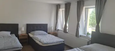 Ein Bett oder Betten in einem Zimmer der Unterkunft Ferienhaus Paul