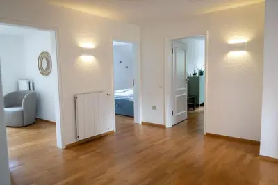 Ein Bett oder Betten in einem Zimmer der Unterkunft Eifel21 - stilvolles Haus in der Vulkaneifel