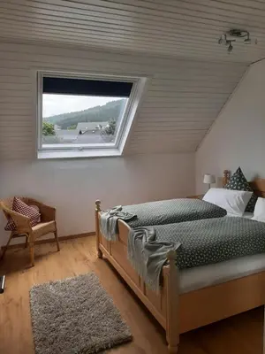 Ein Bett oder Betten in einem Zimmer der Unterkunft Ferienwohnung Marion