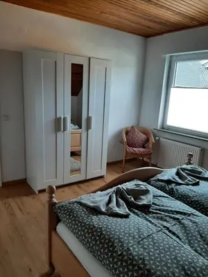 Ein Bett oder Betten in einem Zimmer der Unterkunft Ferienwohnung Marion
