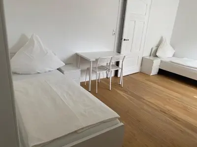 Ein Bett oder Betten in einem Zimmer der Unterkunft Schicke Monteurunterkunft in Mendig mit drei Wohneinheiten