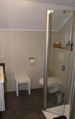 Ein Badezimmer in der Unterkunft Bachmeier's Gasthaus Traube Niederfell