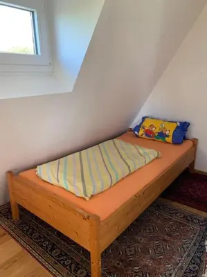 Ein Bett oder Betten in einem Zimmer der Unterkunft Ferienwohnung Rheinblick, Sport-Pool