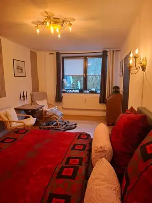 Ein Sitzbereich in der Unterkunft Ferienwohnung Haus Schöneck