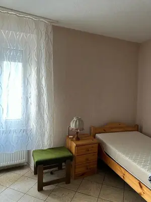 Ein Bett oder Betten in einem Zimmer der Unterkunft Ferienwohnung Vogtei7