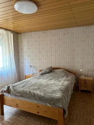 Ein Bett oder Betten in einem Zimmer der Unterkunft Ferienwohnung Vogtei7