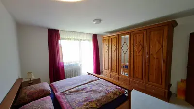 Ein Bett oder Betten in einem Zimmer der Unterkunft Ferienwohnungen Nohner Mühle