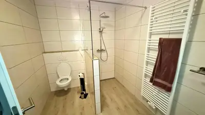Ein Badezimmer in der Unterkunft Ferienwohnungen Nohner Mühle