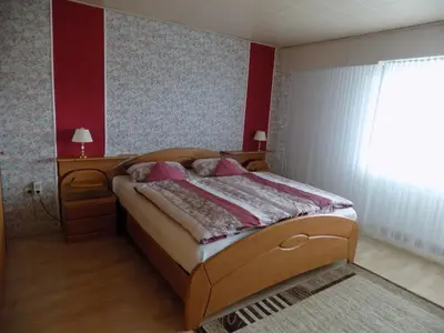 Ein Bett oder Betten in einem Zimmer der Unterkunft Haus Alexandra