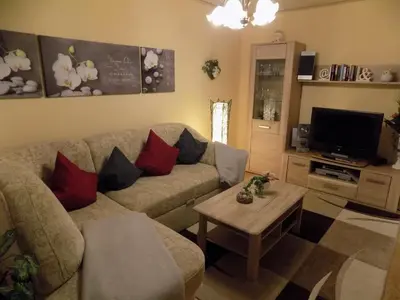 Ein Sitzbereich in der Unterkunft Haus Alexandra