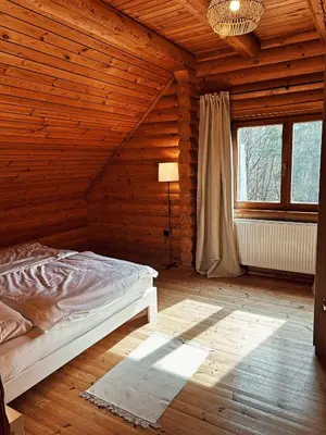 Ein Bett oder Betten in einem Zimmer der Unterkunft Dein gemütliches Waldhaus im Soonwald