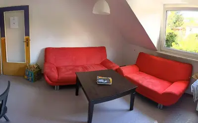 Ein Sitzbereich in der Unterkunft Monkey Factory - Mini Home-Stay Hostel
