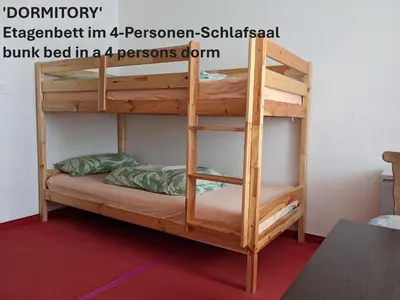 Ein Bett oder Betten in einem Zimmer der Unterkunft Monkey Factory - Mini Home-Stay Hostel