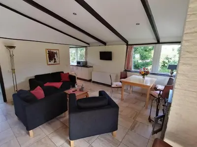 Ein Sitzbereich in der Unterkunft Eifel Residence 2