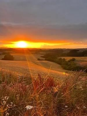 Blick auf den Sonnenuntergang/Sonnenaufgang von der Ferienwohnung aus oder aus der Nähe