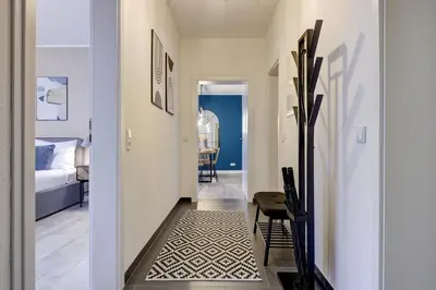 Ein Bett oder Betten in einem Zimmer der Unterkunft Zentrale Design Wohnung in Ufernähe - 105 qm - Parkplatz - Küche - Netflix