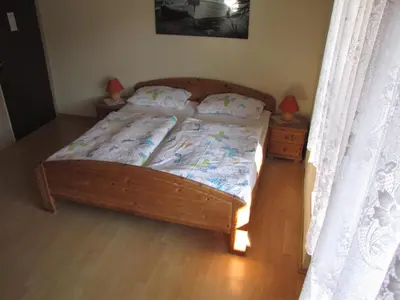 Ein Bett oder Betten in einem Zimmer der Unterkunft B&B Panoramablick