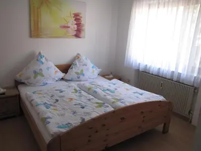 Ein Bett oder Betten in einem Zimmer der Unterkunft B&B Panoramablick