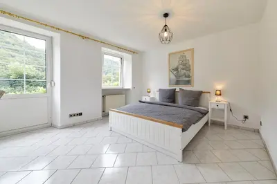 Ein Bett oder Betten in einem Zimmer der Unterkunft Haus am Hafen