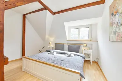 Ein Bett oder Betten in einem Zimmer der Unterkunft Haus am Hafen
