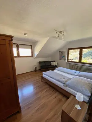 Ein Bett oder Betten in einem Zimmer der Unterkunft Haus am Hang