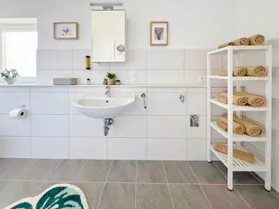 Ein Badezimmer in der Unterkunft Deichstadt Apartments