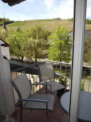 Ein Balkon oder eine Terrasse in der Unterkunft Ferienweingut & Gutsrestaurant Becker