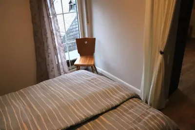 Ein Bett oder Betten in einem Zimmer der Unterkunft Ferienweingut & Gutsrestaurant Becker