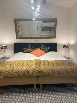 Ein Bett oder Betten in einem Zimmer der Unterkunft Eifelsuiten - Private Spa & Family Hideaway - Kerpen Loogh