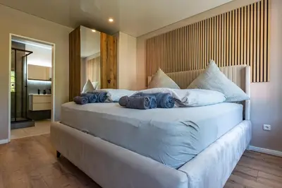 Ein Bett oder Betten in einem Zimmer der Unterkunft Moselresidenz Bellevue Alf Apartment Alfbach