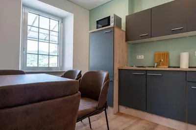 Küche/Küchenzeile in der Unterkunft Moselresidenz Bellevue Alf Apartment Alfbach