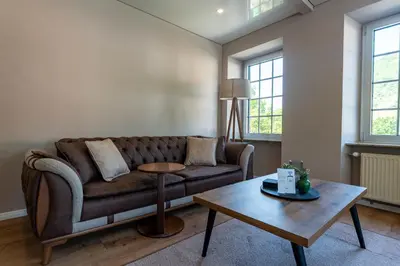 Ein Sitzbereich in der Unterkunft Moselresidenz Bellevue Alf Apartment Alfbach