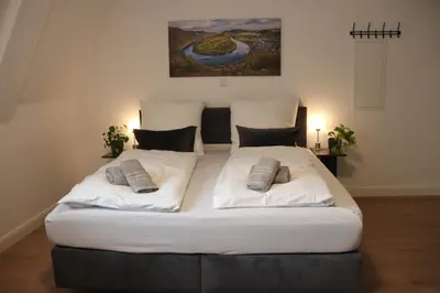 Ein Bett oder Betten in einem Zimmer der Unterkunft Moseltürmchen Cochem