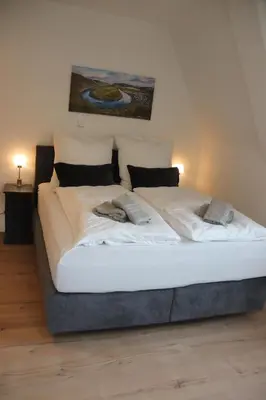 Ein Bett oder Betten in einem Zimmer der Unterkunft Moseltürmchen Cochem