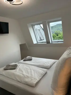 Ein Bett oder Betten in einem Zimmer der Unterkunft Moseltürmchen Cochem